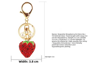 Detailed dimensions of strawberry keychain with red rhinestones and pearls