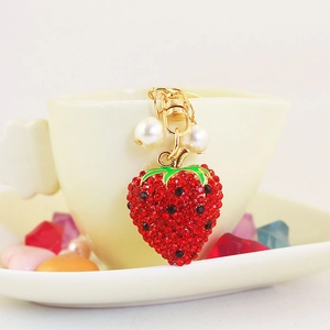Cute strawberry rhinestone keychain with faux pearls and golden clip for bags