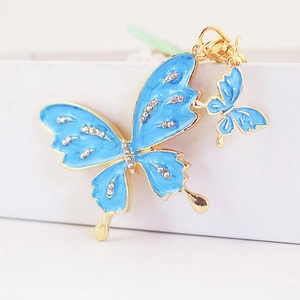 Charming blue and gold butterfly keychain with sparkling rhinestones and metal ring