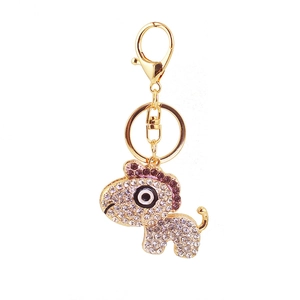 Cute cartoon monster rhinestone keychain with purple crystals and golden hardware