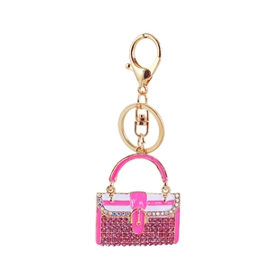Exquisiter rosa Handtaschen-Schlüsselanhänger mit Strasssteinen und goldener Hardware