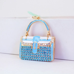 Exquisite Handtasche Schlüsselanhänger mit Strass und hellblauer Emaille in Goldoptik