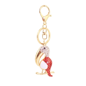 Porte-clés oiseau toucan en strass étincelant avec émail rouge sur anneau doré