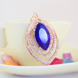 Peacock crystal key ring with blue marquise stone and rose gold diamond setting