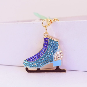 Sparkling blue rhinestone ice skate keychain with golden metal clasp and ring