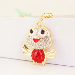 Golden crystal chick keychain with sparkling rhinestones and red gemstone detail