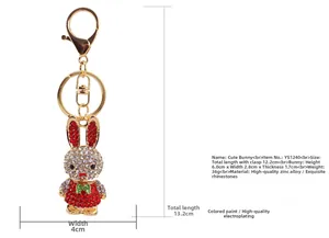 Detailed view of rhinestone rabbit keychain with dimensions and sparkling crystal finish