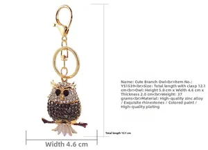 Detailed size specifications of the rhinestone owl keychain showing 12.1cm total length