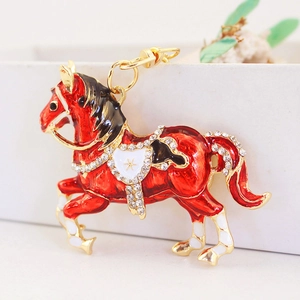 Portachiavi creativo a forma di cavallo rosso in metallo dorato con strass lucidi