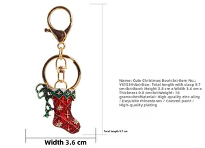 Detailed view of Christmas boot keychain with red enamel, rhinestones and lobster clasp