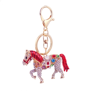 Sparkling crystal horse keychain with colorful gemstones on a gold alloy metal plating