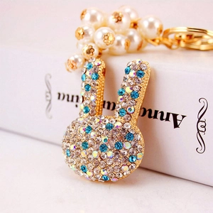 Porte-clés lapin mignon avec cristaux bleus et blancs, perles et fermoir doré chic