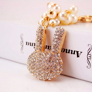 Porte-clés lapin étincelant avec strass, perles élégantes et finition alliage doré