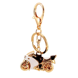 Portachiavi moto scintillante con strass e dettagli M1 su base in metallo dorato