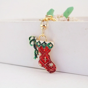 Sparkling Christmas stocking keychain with red enamel and rhinestones for bag charm