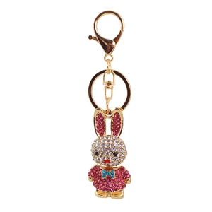 Sparkling rhinestone rabbit keychain with pink and white crystals on gold metal plating