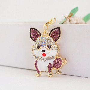 Glitzernder Corgi-Hunde-Schlüsselanhänger mit lila und AB-Steinen auf Goldbasis