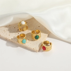 Set of vintage gold adjustable open rings with oval faux stones in multiple colors