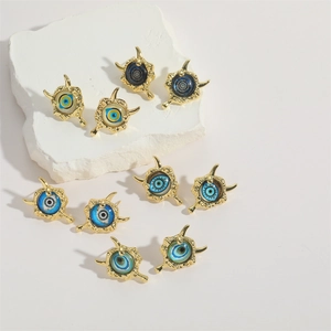 Bohemian gold plated copper evil eye stud earrings set with vintage resin sun designs