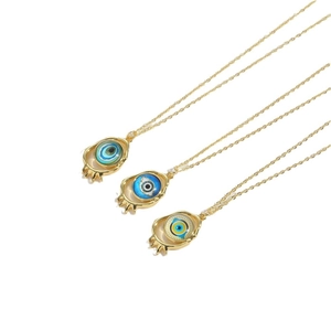14K gold plated evil eye pendant necklaces with colorful resin accents and eyelash detail
