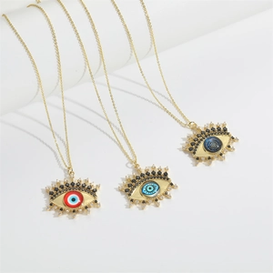 Bohemian gold Evil Eye necklaces with red, light blue and dark blue zircon pendants