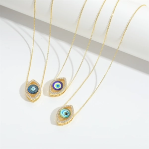 Exotic evil eye pendant necklaces in gold finish with blue and green zircon stones