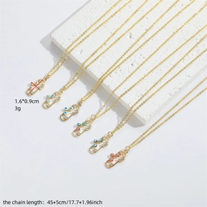 Golden Evil Eye pill-shaped pendant necklace with white diamonds on a minimalist chain