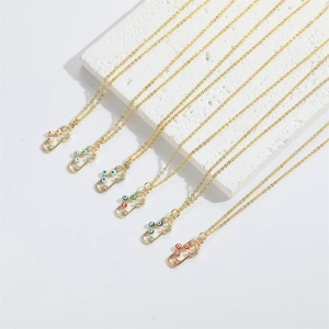 Gold Evil Eye necklaces with capsule pendants and micro-pave zircons in various colors