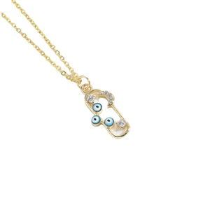 Exotic Evil Eye pendant necklace with gold chain and blue beads in a vintage choker style
