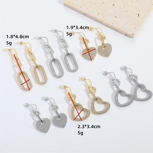 Romantic long drop heart earrings in gold and silver finish with zircon stones