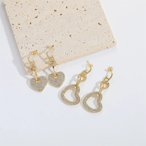 Romantic gold heart drop earrings with shimmering crystals for a luxurious fashion look