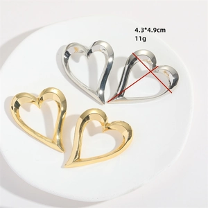 Exaggerated hollow heart earrings in gold and silver, size 4.3x4.9cm, 11g lightweight