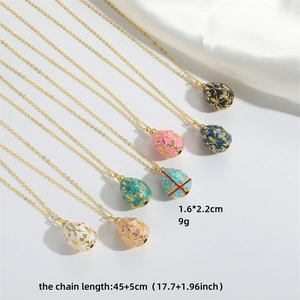 Vintage enamel egg pendants with golden filigree and crystals in six colors