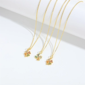 Elegant gold necklaces featuring colorful zircon windmill and clover shaped pendants