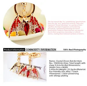 Detailed view of rhinestone bat keychain with dimensions and sparkling crystal texture