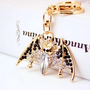 Cute bat keychain with rhinestones and drop crystal charm in gold metal finish