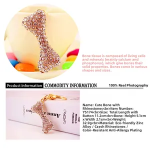 Detail showing dimensions of rose gold bone keychain with sparkling rhinestones for bag