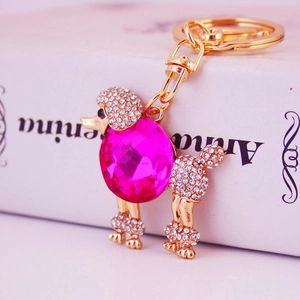 Portachiavi con barboncino in cristallo rosa brillante e placcatura in oro e strass