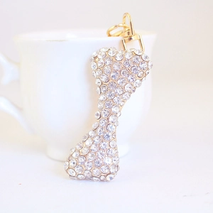 Sparkling crystal bone keychain with gold rotating clasp for women's handbags