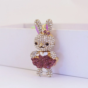Portachiavi con coniglio a cartone animato in strass scintillanti con orecchie viola