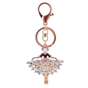 Golden ballet dancer keychain with black lacquer top and colorful crystal rhinestone skirt