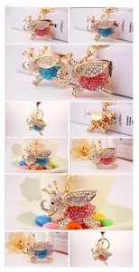 Detailed close-up of elephant bee keychain with colorful rhinestones and lobster clasp