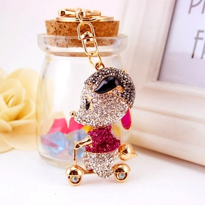 Sparkling crystal mouse on scooter keychain with gold-tone hardware for women's bags