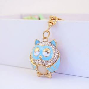 Blue enamel owl keychain with white rhinestones and gold alloy clip for handbags