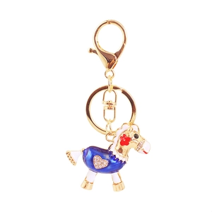 Porte-clés cheval à bascule créatif en métal doré avec émail bleu et détails en cristal