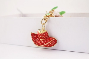 Sparkling red rhinestone sun hat keychain accessory with gold alloy base and hook