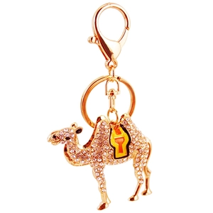 Creative camel keychain with sparkling rhinestones and colorful enamel detailing in gold