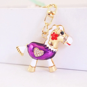Charming purple rocking horse keychain with sparkling rhinestones and gold alloy hardware