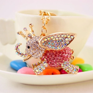 Cute flying elephant keychain with gold alloy plating and sparkling rhinestone crystals