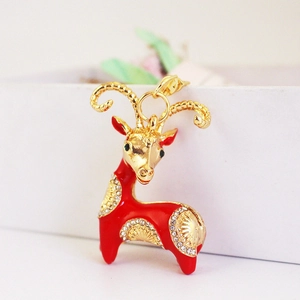 Sparkling red enamel goat keychain with gold details and crystal rhinestones for bags